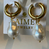 Large pearl earrings