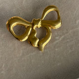 Bow brooch